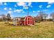 Red shed with covered seating area at 129 Ann St, Salisbury, NC 28146