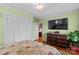 Bedroom with built-in closet and large TV at 129 Ann St, Salisbury, NC 28146