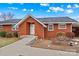 Brick ranch home with landscaped yard at 129 Ann St, Salisbury, NC 28146