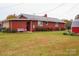 Brick ranch house with landscaped yard at 129 Ann St, Salisbury, NC 28146