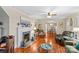 Spacious living room with hardwood floors, fireplace, and open concept design at 129 Ann St, Salisbury, NC 28146