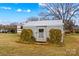 Metal shed with door and landscaping at 129 Ann St, Salisbury, NC 28146