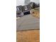 Long concrete driveway leading up to a partially-constructed home at 184 Maplewood Ln, Taylorsville, NC 28681