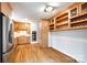 Well-appointed kitchen features wood cabinetry, stainless appliances, and plenty of space for culinary creations at 3319 Mill Pond Rd, Charlotte, NC 28226