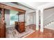 Foyer with hardwood floors, staircase, and wet bar at 335 Blume Rd, Mooresville, NC 28117