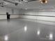 Spacious garage with epoxy flooring and abundant lighting at 335 Blume Rd, Mooresville, NC 28117