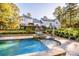 View of backyard pool and house at 335 Blume Rd, Mooresville, NC 28117