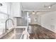 Modern kitchen with stainless steel sink and white cabinets at 353 Lee St, Mooresville, NC 28115