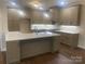 Spacious kitchen features a large island with a sink and stainless steel appliances at 4033 Stadler Ne Dr # 22, Conover, NC 28613