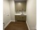 Mud room features ample cabinetry, counter space, undermount sink, and convenient washer/dryer hookups at 4033 Stadler Ne Dr # 22, Conover, NC 28613
