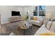 Inviting living room with neutral tones, stylish rug, and ample natural light at 8005 Elevate Ct, Charlotte, NC 28205