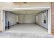 Large garage with epoxy flooring and ample storage at 116 Diamond Head Dr, Mooresville, NC 28117