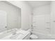 Clean bathroom featuring a white vanity, framed mirror, and a shower-tub combination for convenience at 1531 Harper Landing Blvd, Stanley, NC 28164