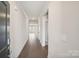 Inviting entryway with wood-look flooring and neutral walls, offering a bright and welcoming entrance at 1531 Harper Landing Blvd, Stanley, NC 28164