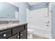 Bathroom with granite vanity and tub/shower combo at 19935 Wooden Tee Dr, Davidson, NC 28036