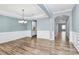 Formal dining room with hardwood floors and chandelier at 19935 Wooden Tee Dr, Davidson, NC 28036