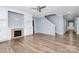 Living room with fireplace, built-ins, and hardwood floors at 19935 Wooden Tee Dr, Davidson, NC 28036