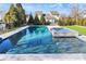 Stunning pool and spa with spacious patio at 19935 Wooden Tee Dr, Davidson, NC 28036