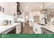 Modern white kitchen with large island and black accents at 2017 South St, Charlotte, NC 28208