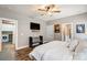 Main bedroom with wood floors and laundry access at 226 Hickory St, Locust, NC 28097