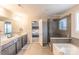 Modern bathroom with a large shower and soaking tub at 3960 Farmington Ridge Pkwy, Charlotte, NC 28213