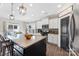 Modern kitchen with granite countertops and stainless steel appliances at 3960 Farmington Ridge Pkwy, Charlotte, NC 28213