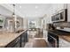 Spacious kitchen boasts granite countertops and an island at 3960 Farmington Ridge Pkwy, Charlotte, NC 28213