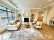 Bright and airy living room features a fireplace, large windows, and elegant decor at 409 Newstyle Way # 3, Cramerton, NC 28056