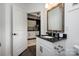 Stylish bathroom featuring a granite vanity and contemporary fixtures, with an open doorway to another room at 411 Newstyle Way # 4, Cramerton, NC 28056