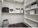 Well-organized walk-in closet with ample shelving and designer shopping bags at 411 Newstyle Way # 4, Cramerton, NC 28056