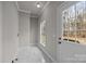 Bright mud room featuring sleek marble floors, and an exterior door bringing in natural light at 4759 Mel Nunnery Rd, Fort Lawn, SC 29714