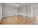 Open living room with hardwood flooring and neutral color scheme at 4759 Mel Nunnery Rd, Fort Lawn, SC 29714