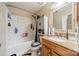 Full bathroom with a shower-tub combo and a single vanity at 5218 Haybridge Rd, Charlotte, NC 28269