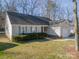 Charming single Gathering home with a one car garage and a well manicured front lawn at 5218 Haybridge Rd, Charlotte, NC 28269