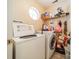 Functional laundry area featuring modern appliances and ample storage space at 5218 Haybridge Rd, Charlotte, NC 28269