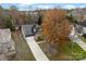 Aerial view of the home, showcasing the roof, long driveway, and surrounding landscape at 7708 Spanish Oaks Dr, Waxhaw, NC 28173