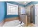 Relaxing bathroom with a corner soaking tub and glass shower at 7708 Spanish Oaks Dr, Waxhaw, NC 28173