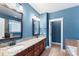 Bathroom boasts double vanity and granite countertops at 7708 Spanish Oaks Dr, Waxhaw, NC 28173