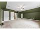 Large bedroom with double closets and ceiling fan at 7708 Spanish Oaks Dr, Waxhaw, NC 28173