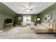 Spacious bonus room with L-shaped sofa and two armchairs at 7708 Spanish Oaks Dr, Waxhaw, NC 28173