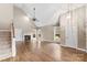 Two-story living room with hardwood floors and fireplace at 7708 Spanish Oaks Dr, Waxhaw, NC 28173