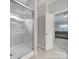 Modern bathroom with a glass shower and gray tile at 7721 Sedgebrook E Dr, Stanley, NC 28164