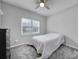 Bedroom with gray walls, carpet, and a window at 7721 Sedgebrook E Dr, Stanley, NC 28164