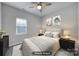 Virtually staged bedroom with a neutral color scheme at 7721 Sedgebrook E Dr, Stanley, NC 28164