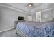 Spacious bedroom with gray walls and carpet at 7721 Sedgebrook E Dr, Stanley, NC 28164