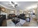 Spacious living room with hardwood floors and fireplace at 7721 Sedgebrook E Dr, Stanley, NC 28164