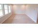 Spacious carpeted bedroom with large windows providing ample natural light at 7932 Cedarsmith Ct, Charlotte, NC 28217