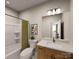 Clean bathroom with tub shower combination and vanity at 8008 Cedarsmith Ct, Charlotte, NC 28217