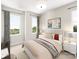 Bright bedroom featuring a comfortable bed and ample natural light at 8008 Cedarsmith Ct, Charlotte, NC 28217