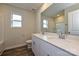 Bathroom featuring a double sink vanity with white cabinets and quartz countertops at 827 Blue Canyon Dr, York, SC 29745